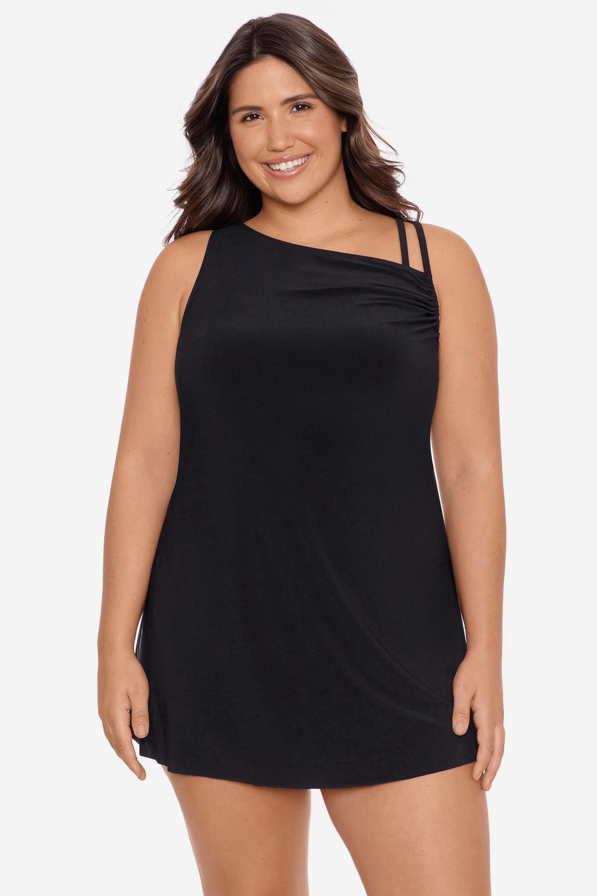 Woman wearing a black swim dress with different straps