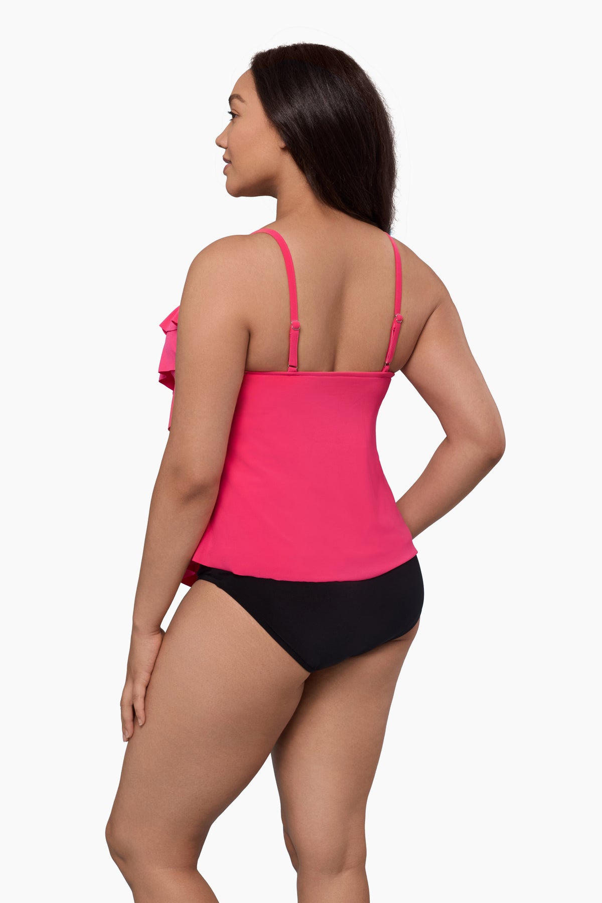 Woman faced left wearing a tiered tankini top in rose pink
