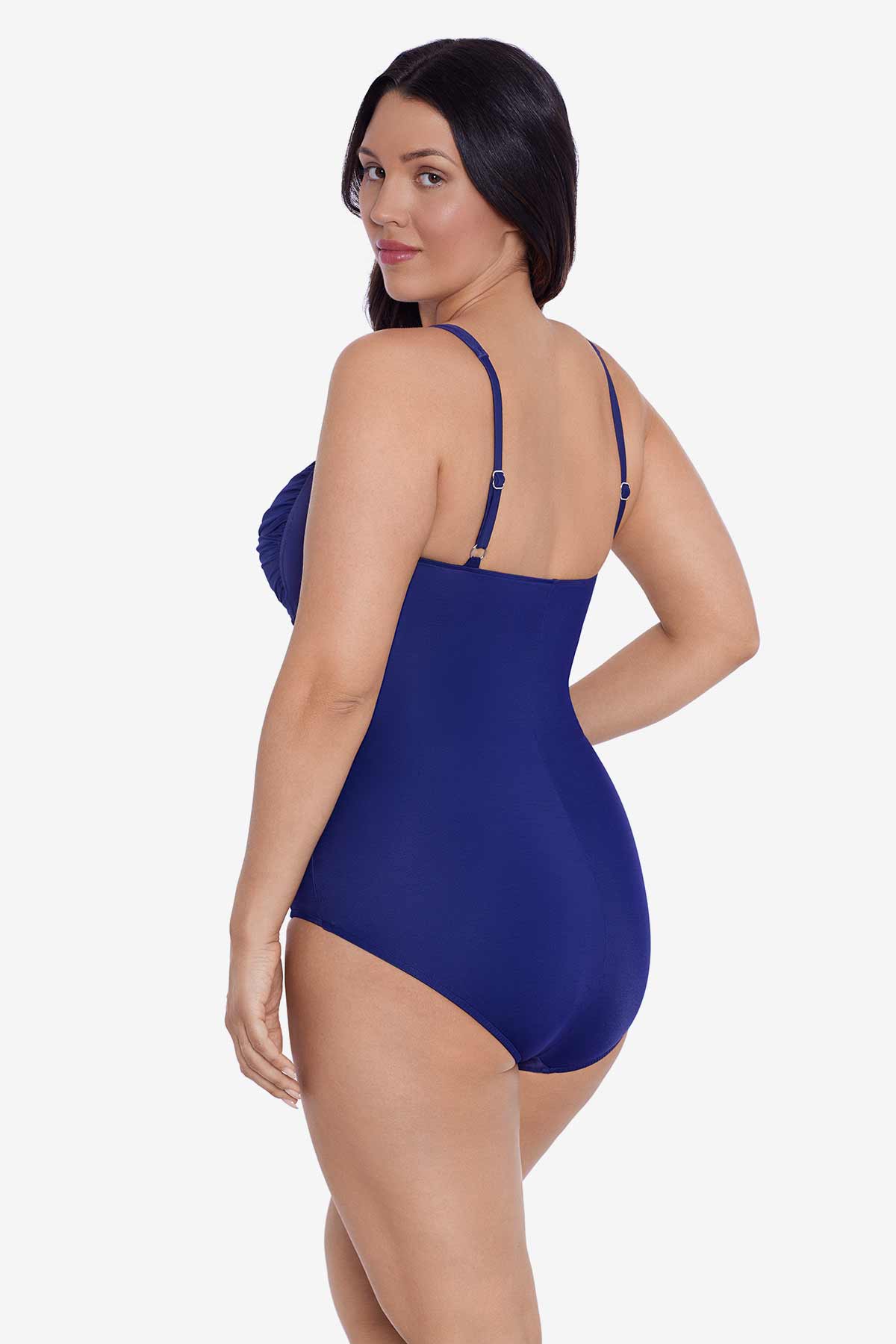 Woman turned left wearing a navy-blue one-piece swimsuit