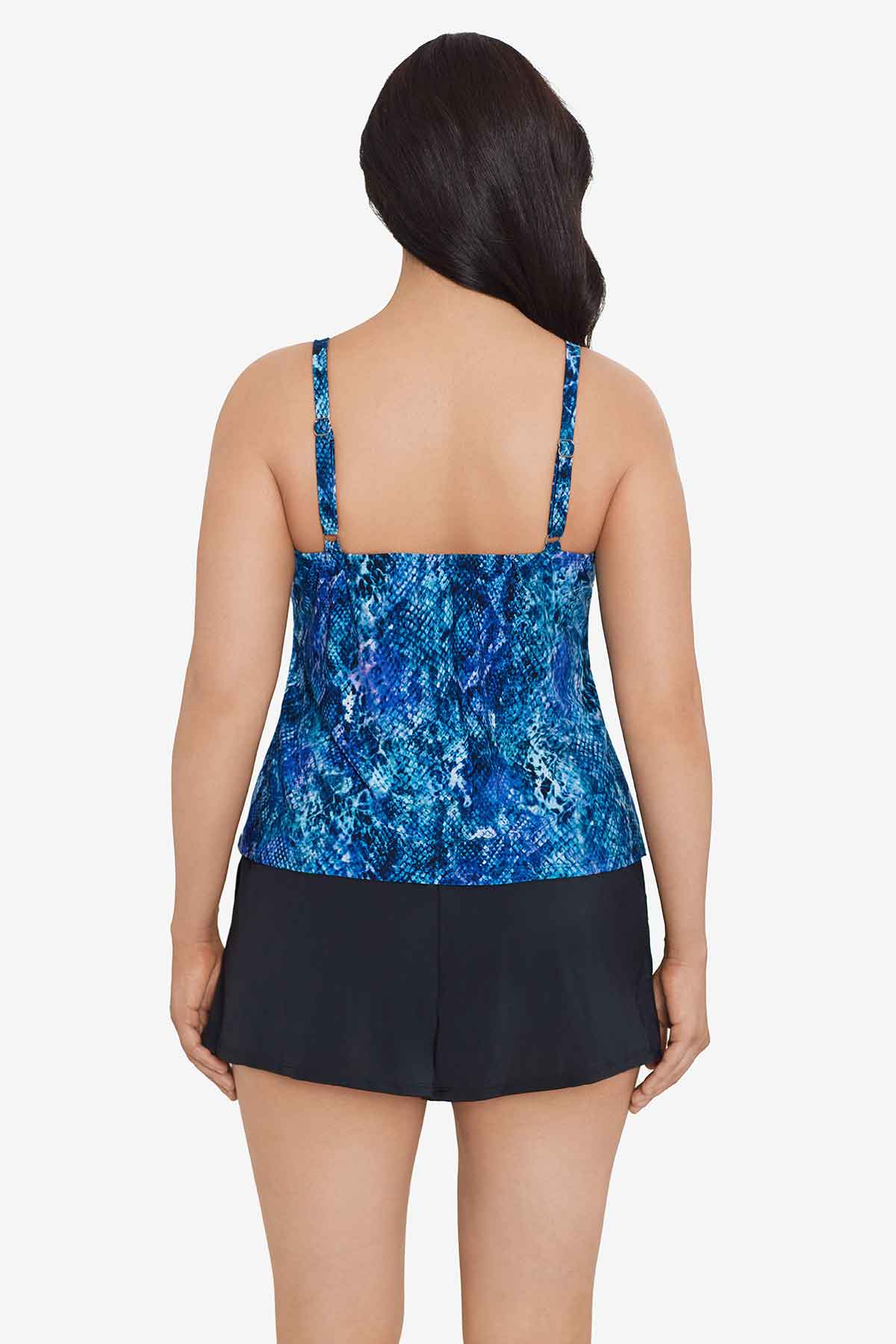 Woman faced away wearing a blue abstract printed swim romper
