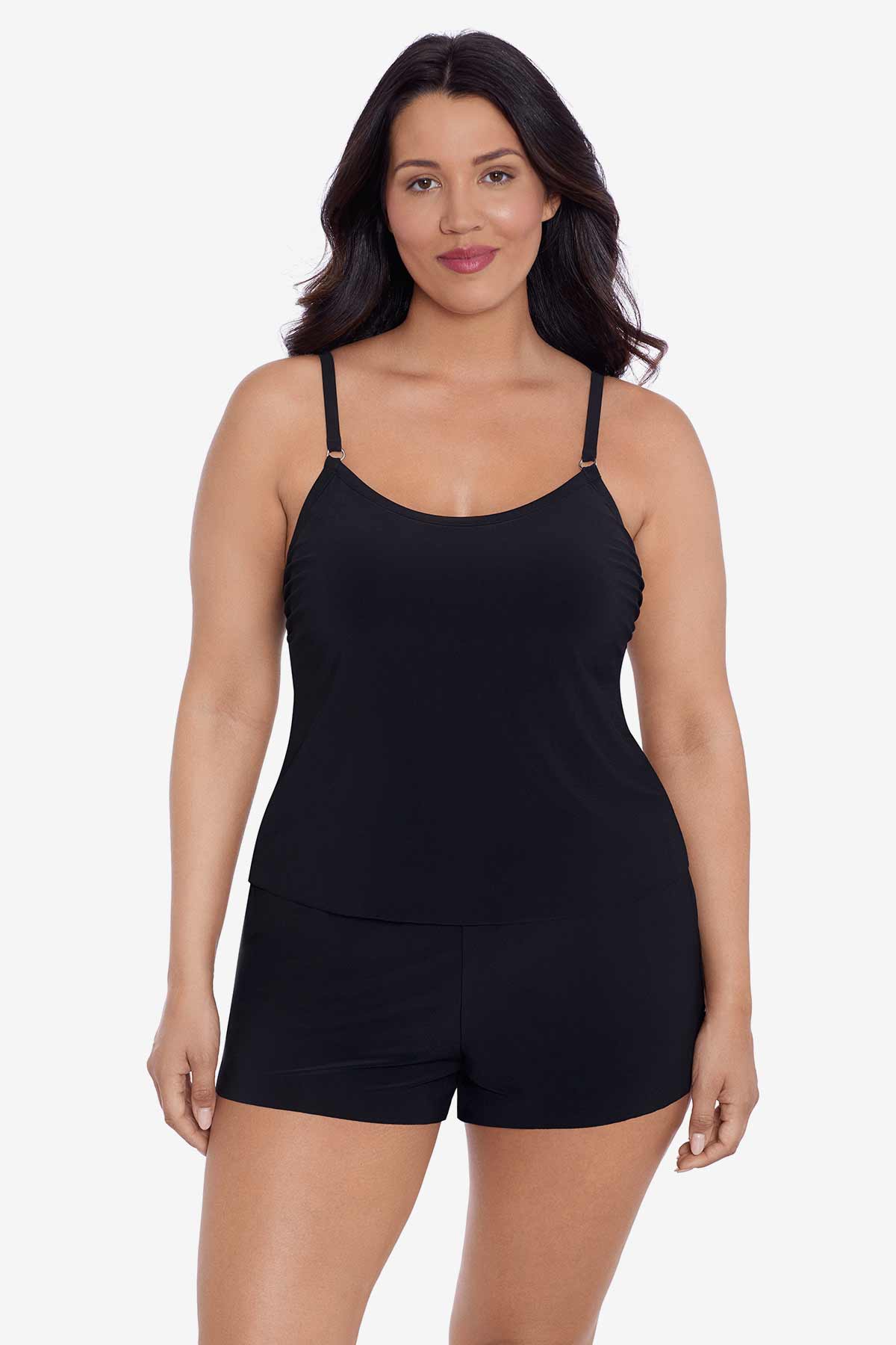 Woman wearing a black swim romper