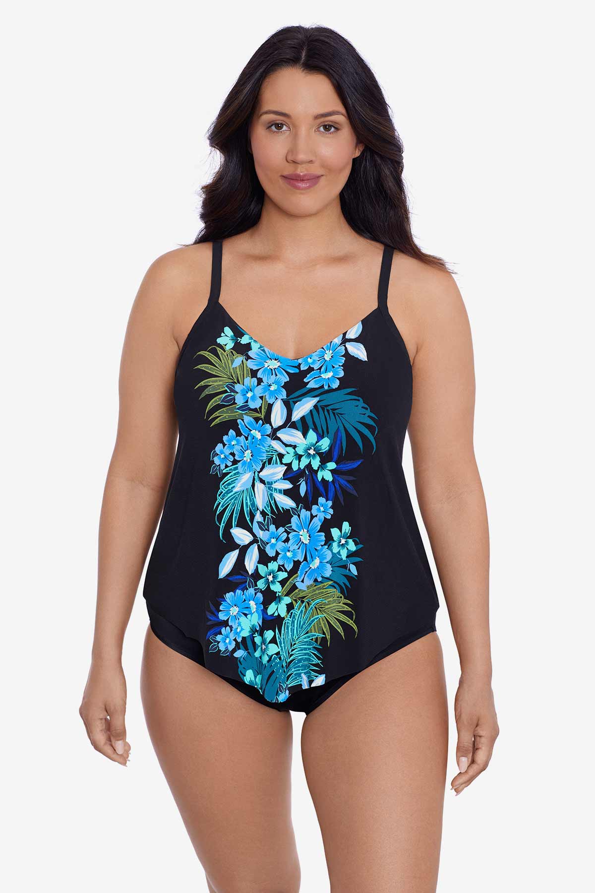 Woman wearing a black tankini top with a blue floral pattern down the front