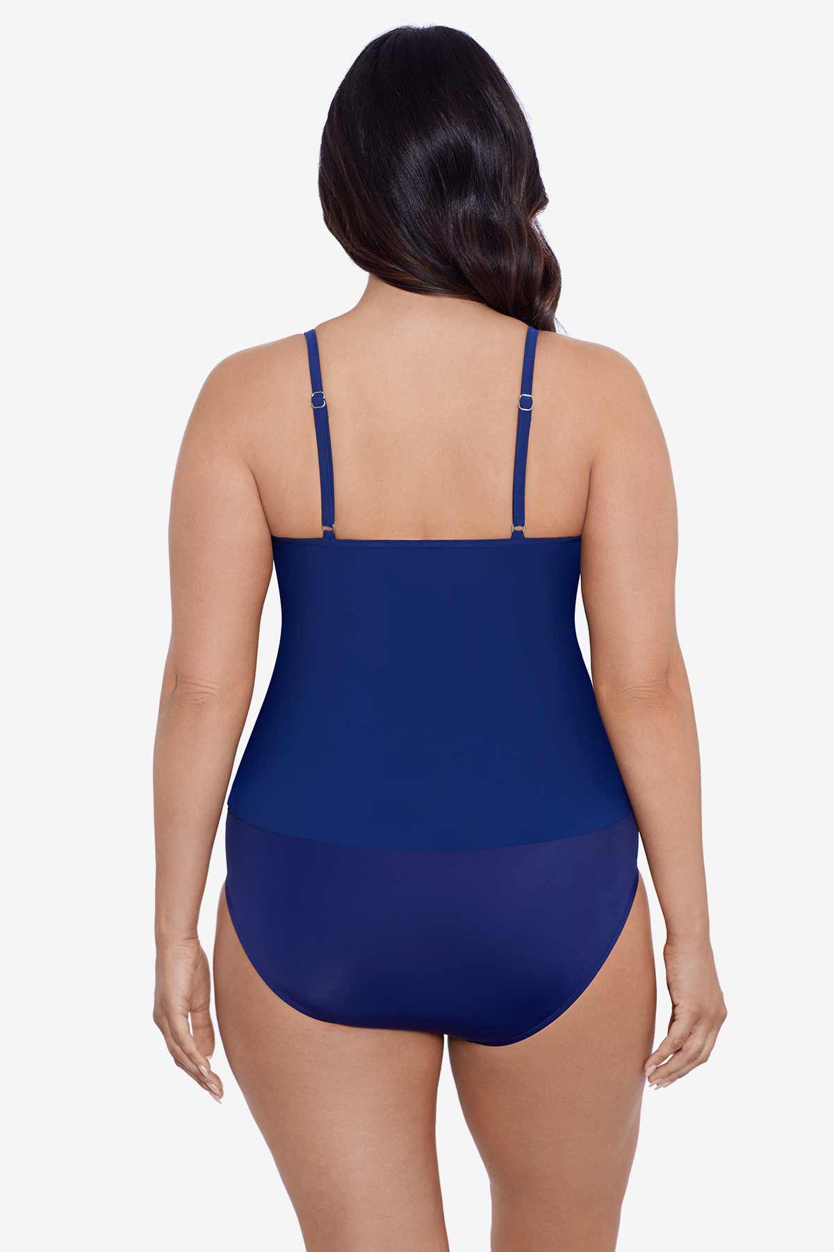 Woman faced away wearing a navy-blue tiered ruffle tankini top