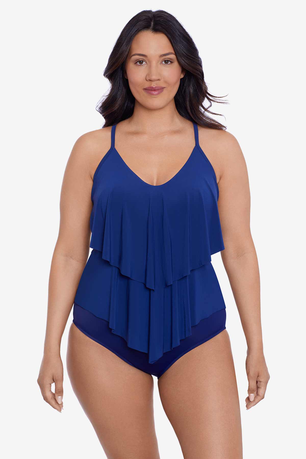 Woman wearing a navy-blue tiered ruffle tankini top