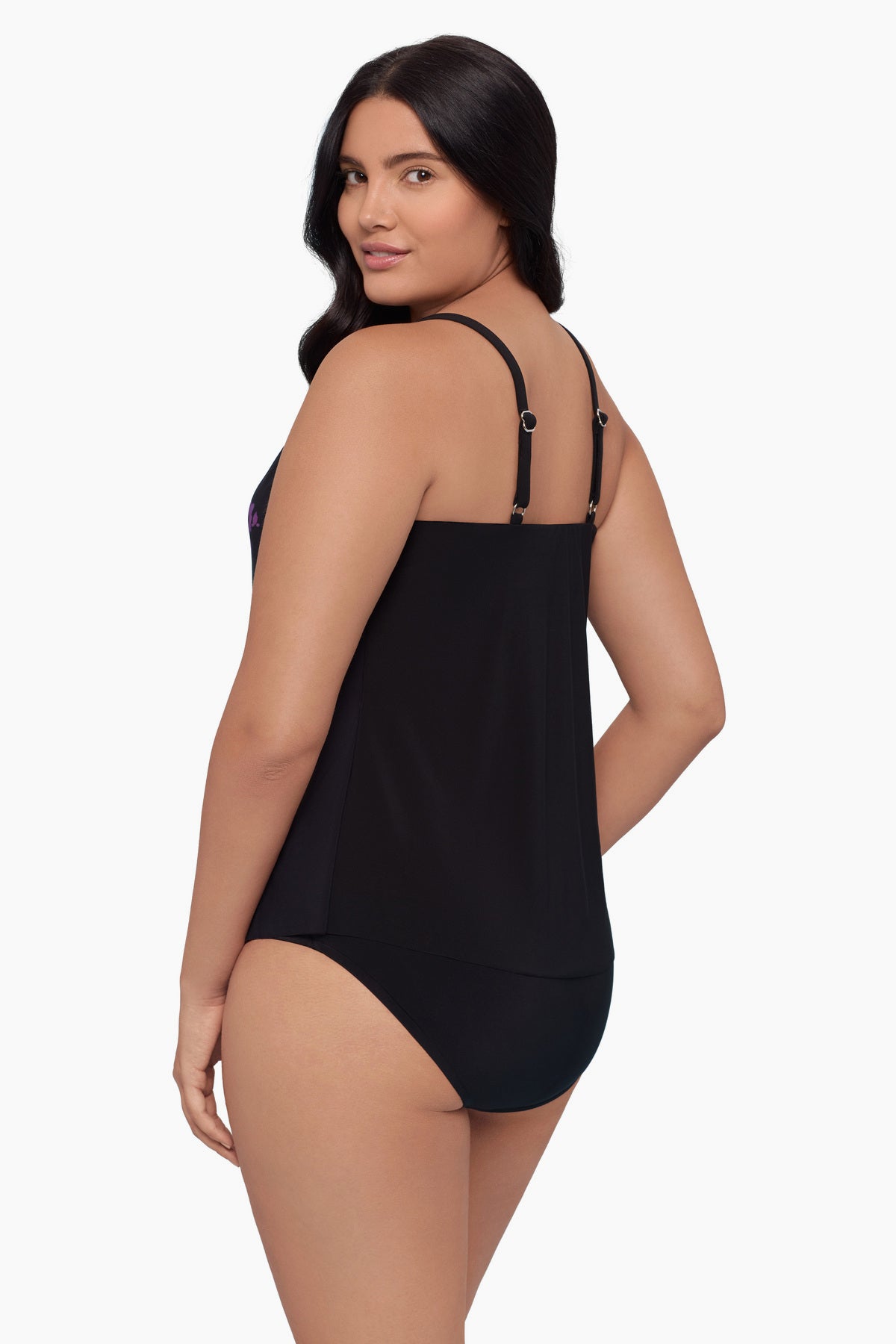 Woman turned left wearing a tankini top with a floral print down the middle