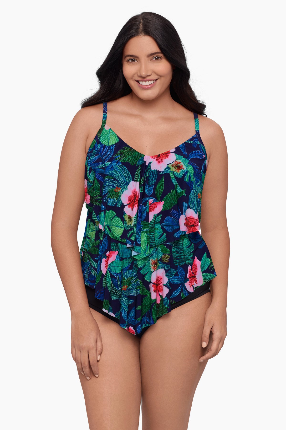 Woman wearing a tankini top with a floral print