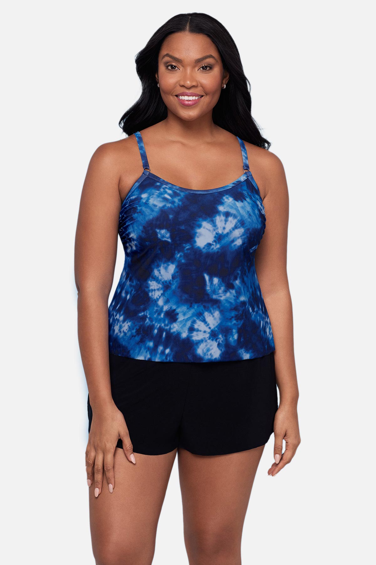 Woman wearing a blue tie dye swim romper