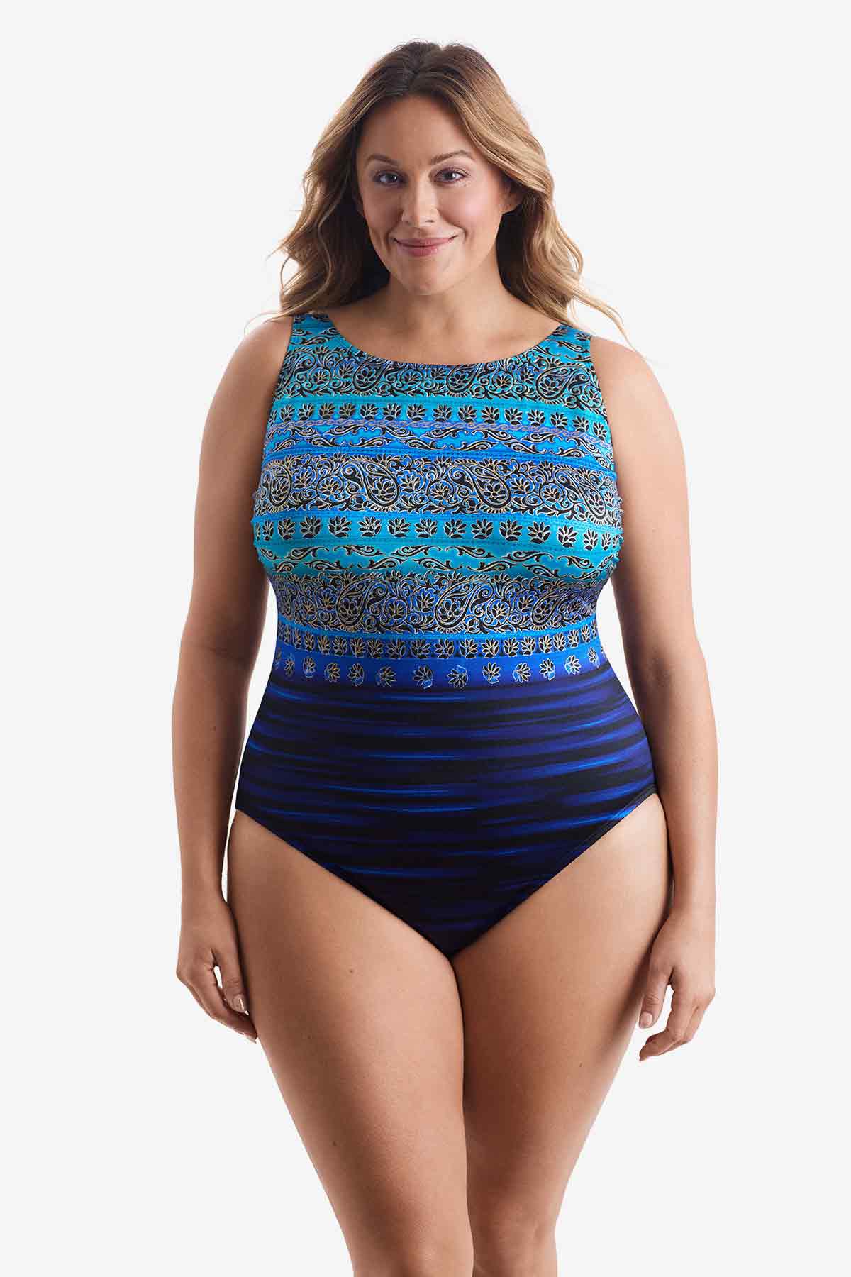 Woman wearing a one-piece swimsuit with a dual pattern in blue