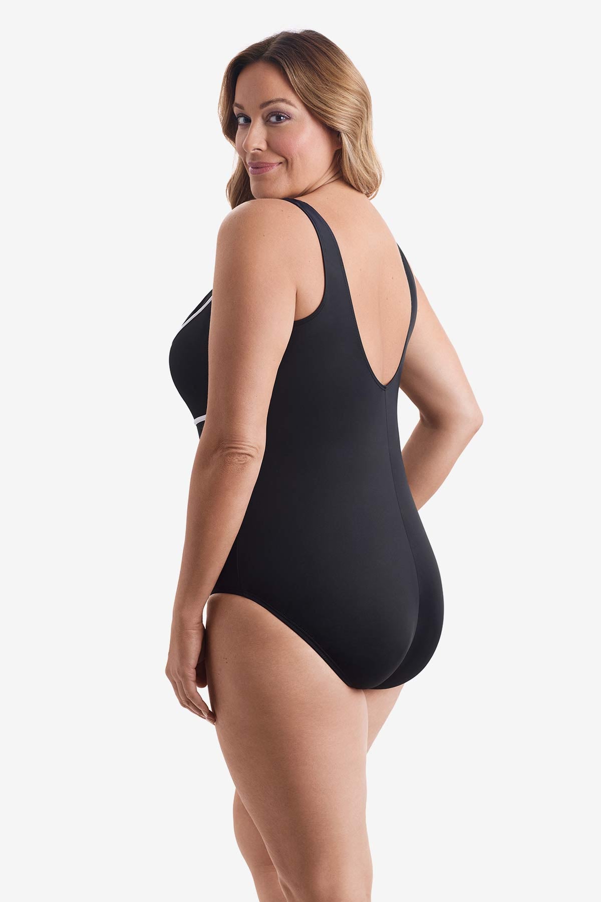 Woman faced left wearing a one-piece swimsuit