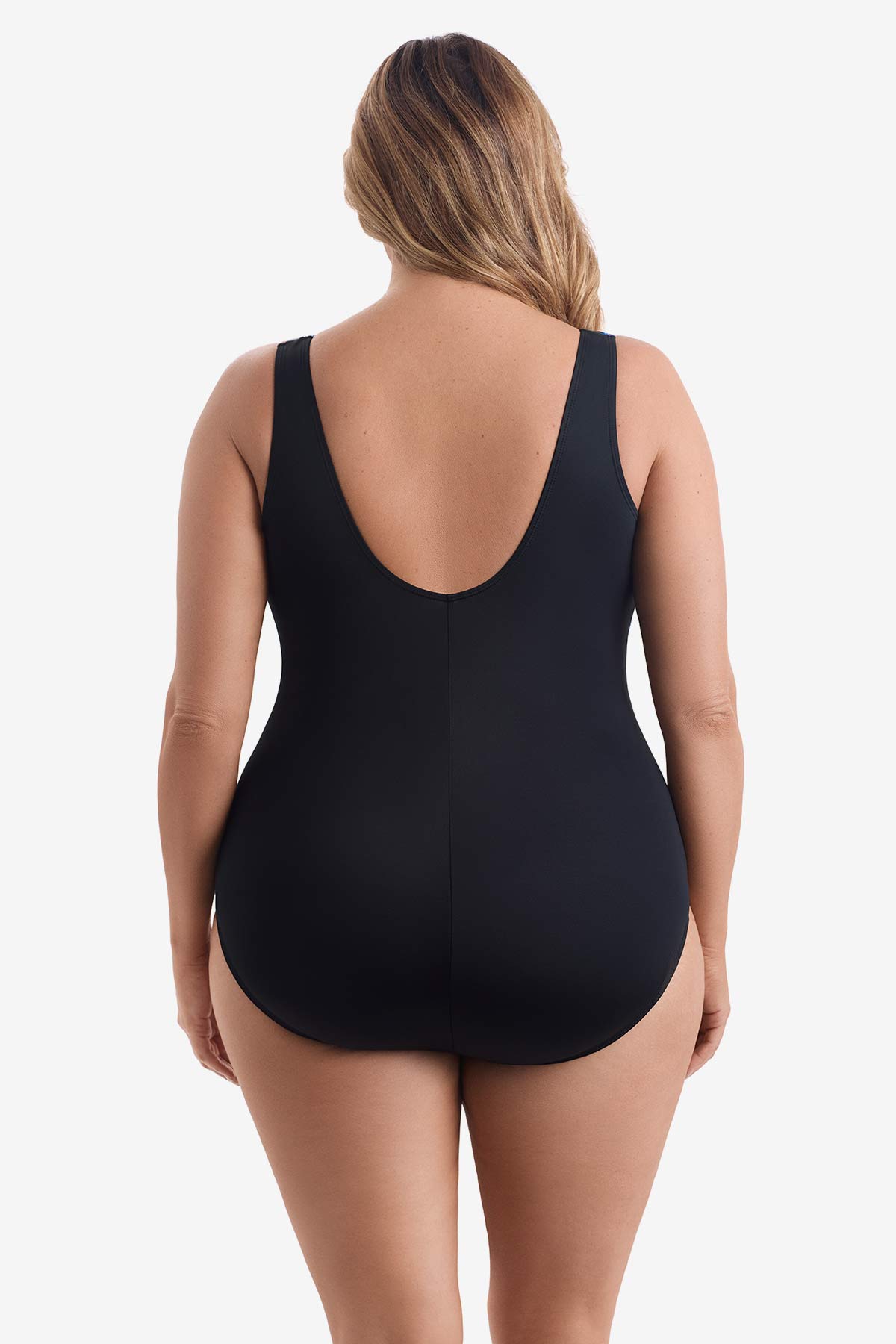 Woman faced away wearing a one-piece swimsuit