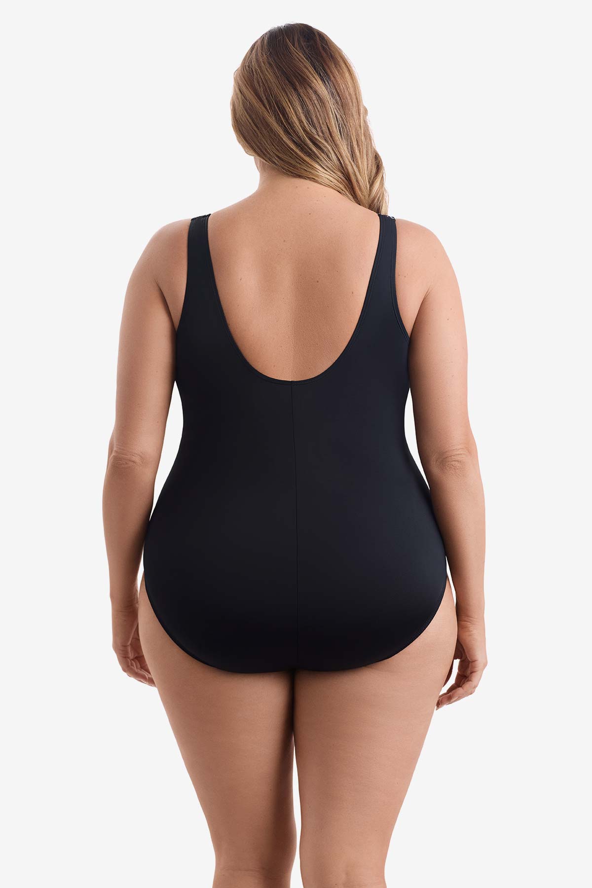 Woman wearing a black one-piece swimsuit