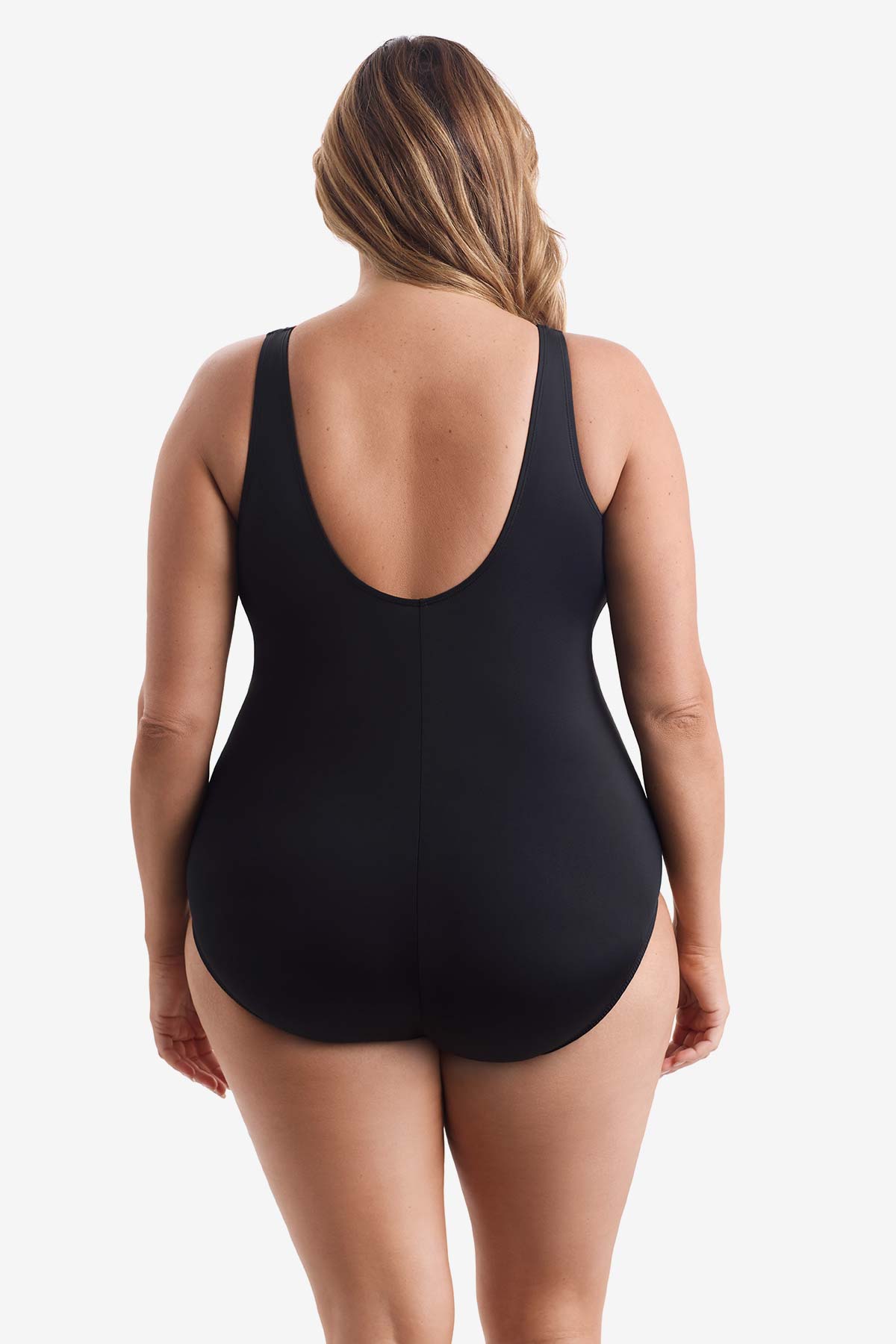 Woman faced away wearing a black one-piece swimsuit