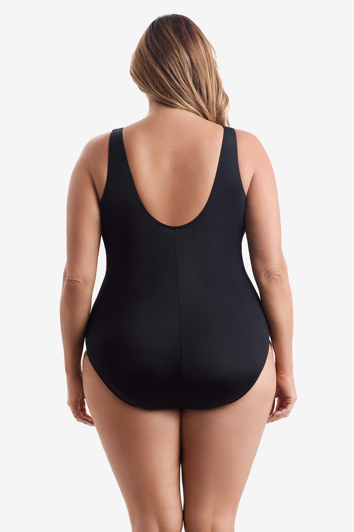 Woman wearing a black one-piece swimsuit