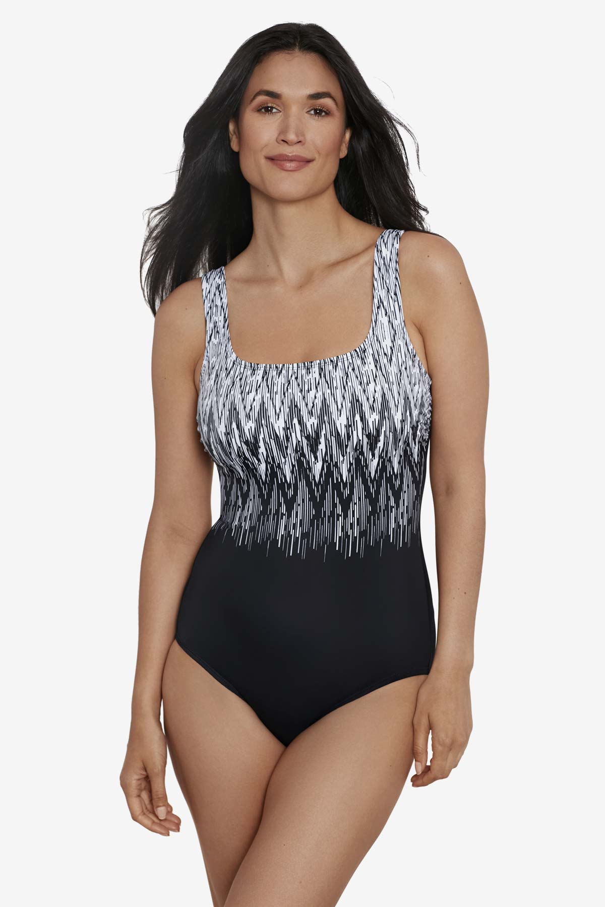 Woman wearing a black and white zig zag pattern on the bust one-piece swimsuit