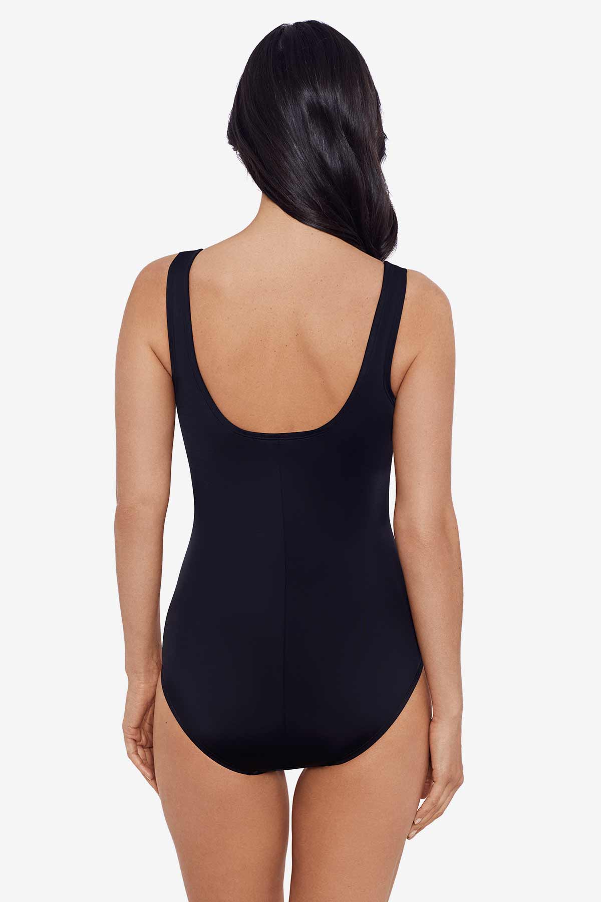 Woman faced away wearing a black one-piece swimsuit
