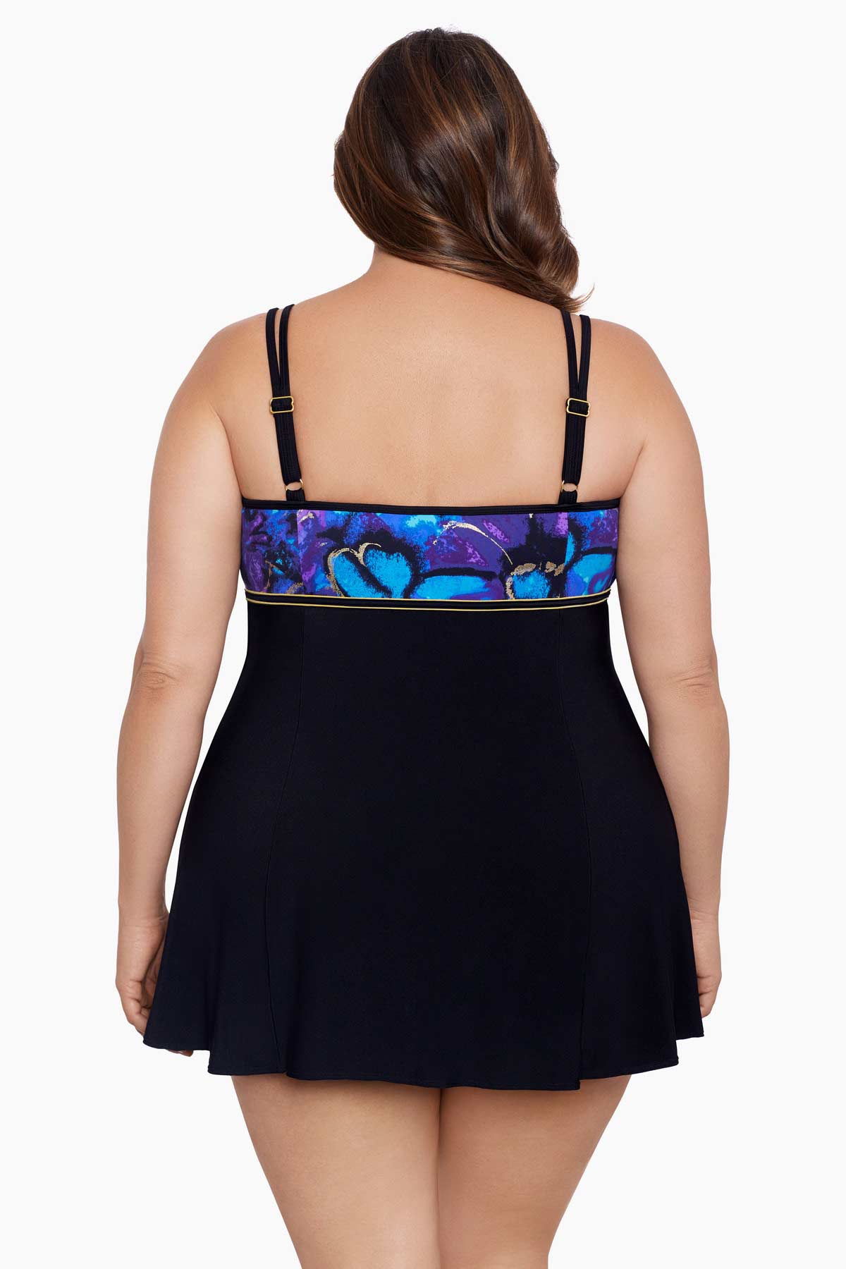 Woman faced away wearing a blue and gold floral printed at the back bust black swim dress