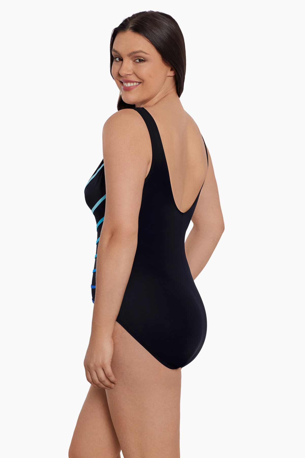 Woman turned left wearing a black and blue ombre fan pattern one-piece swimsuit