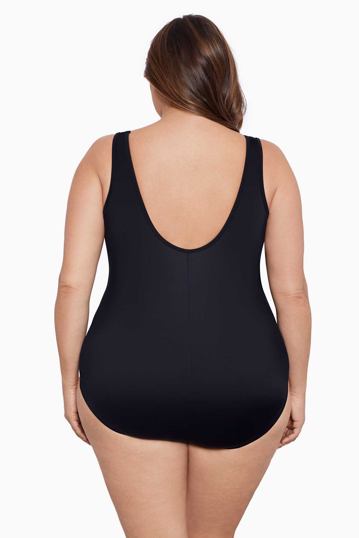 Woman faced away wearing a black mesh high neck one-piece swimsuit