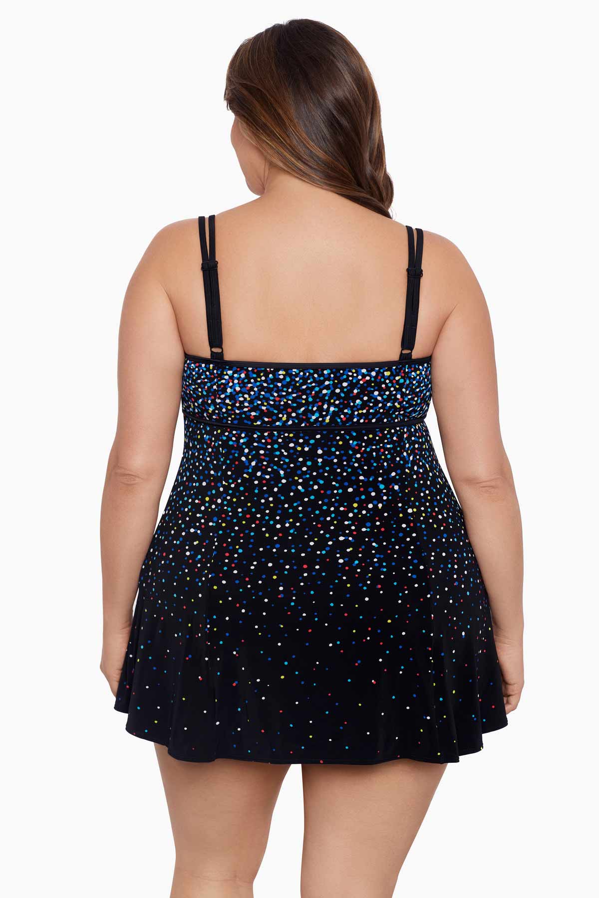 Woman faced away wearing a multicolored speckled pattern black swim dress