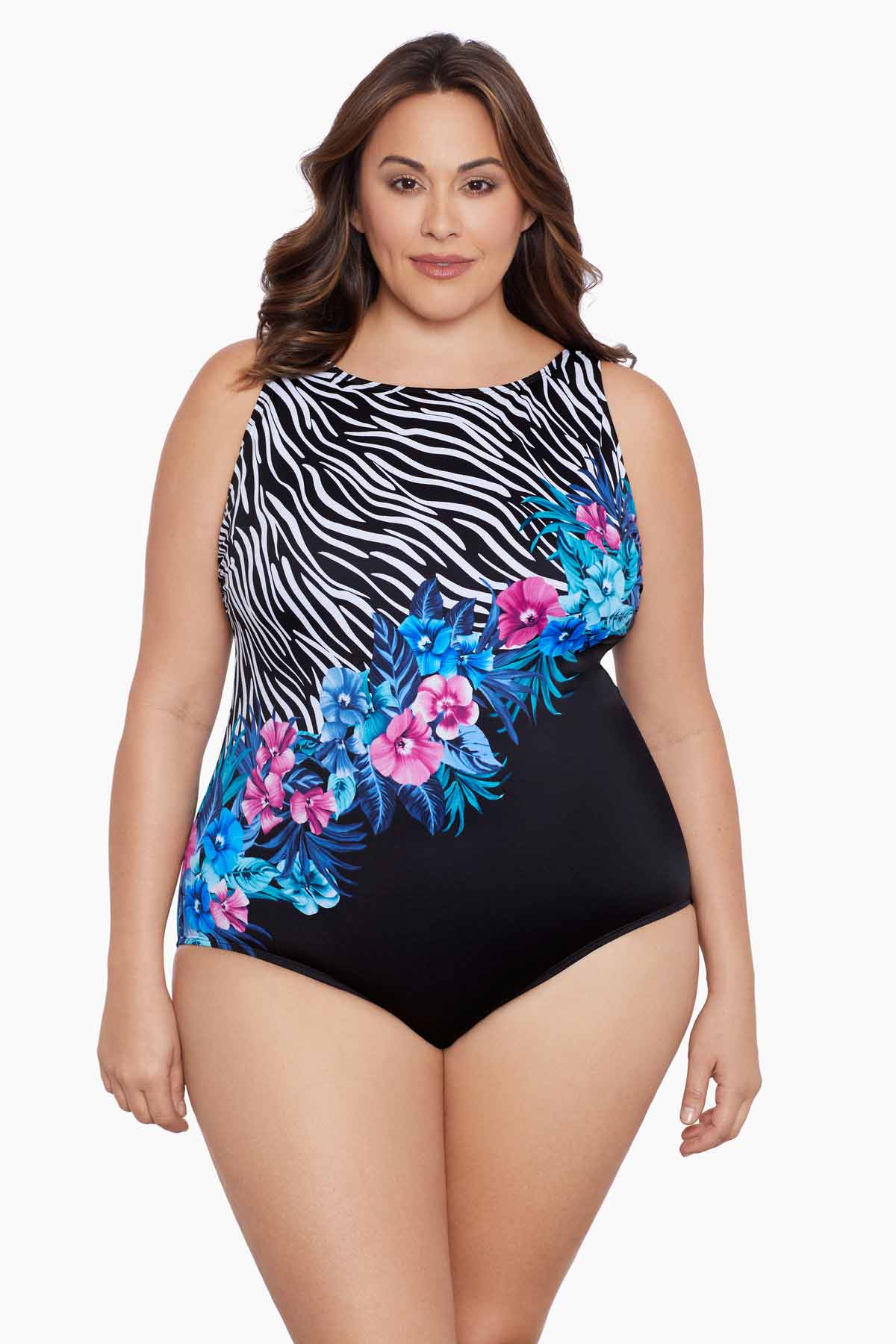 Woman wearing a half zebra print separated by a floral print one-piece swimsuit