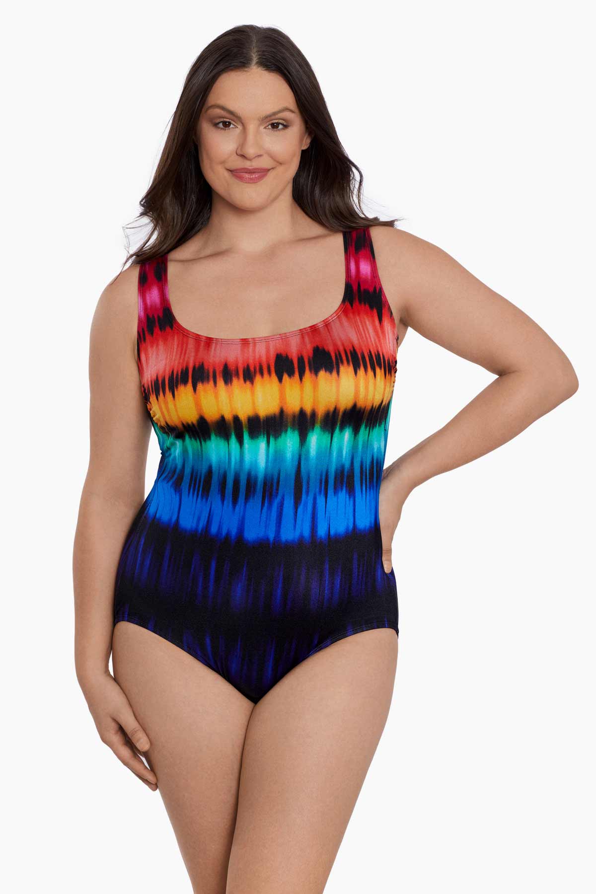 Woman wearing a rainbow tie dye one-piece swimsuit