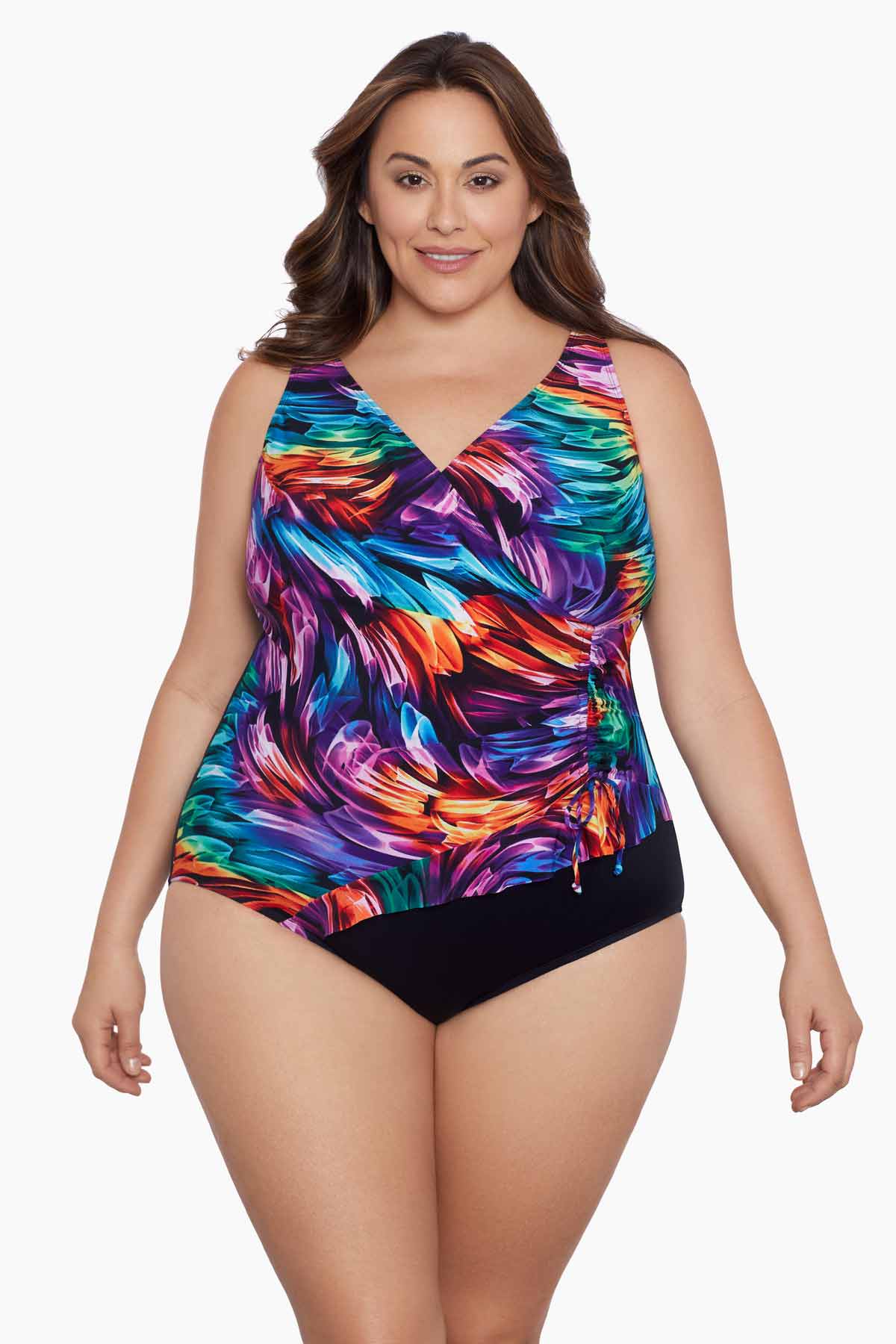 Woman wearing a rainbow ribbon pattern one-piece swimsuit