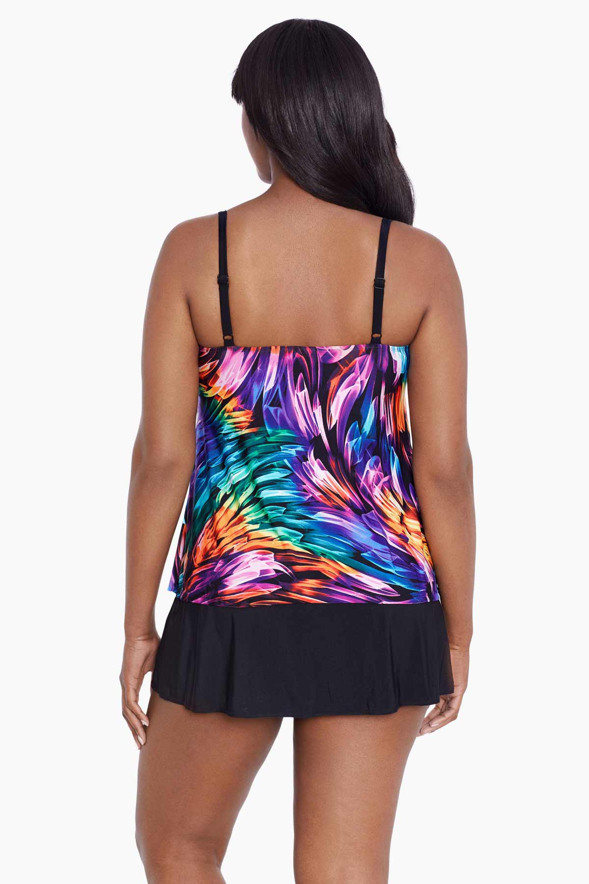 Woman faced away wearing a rainbow ribbon printed ruffle skirtini swimsuit