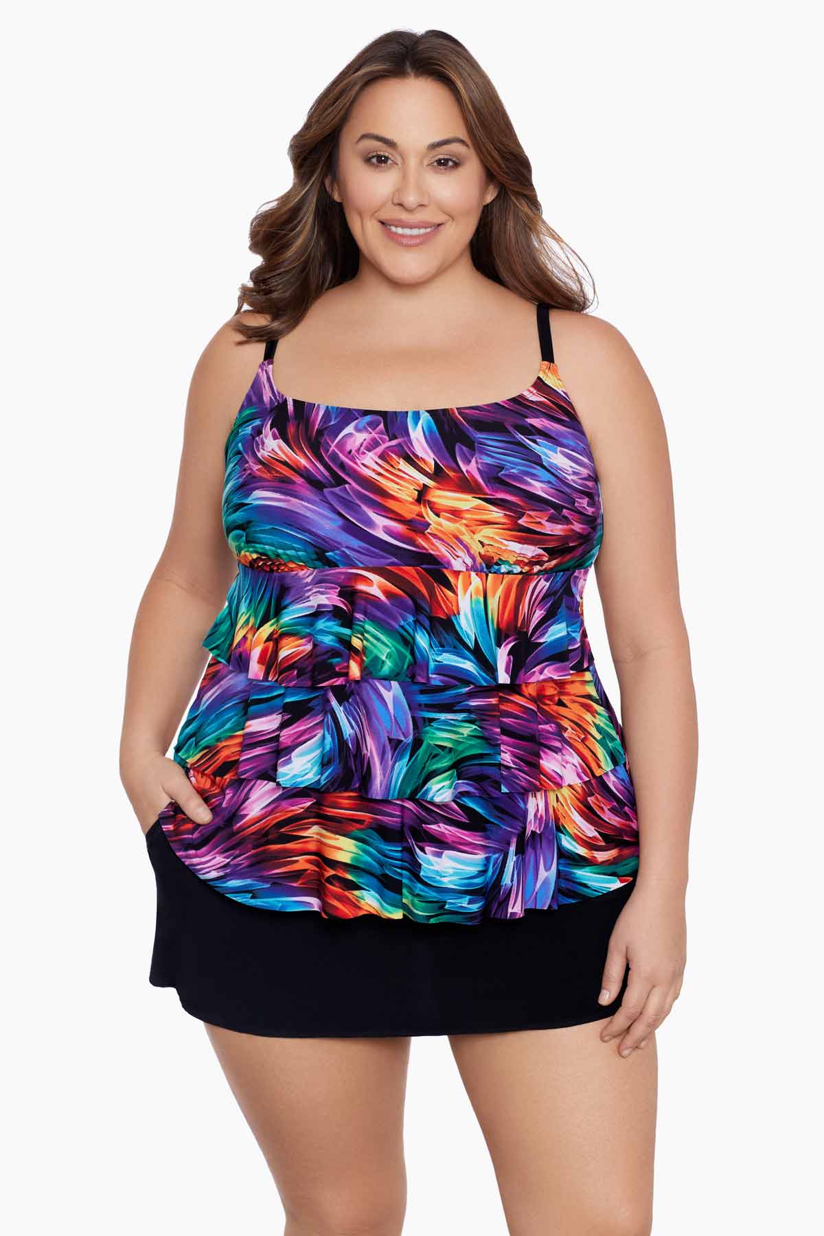 Woman wearing a rainbow ribbon printed ruffle skirtini swimsuit