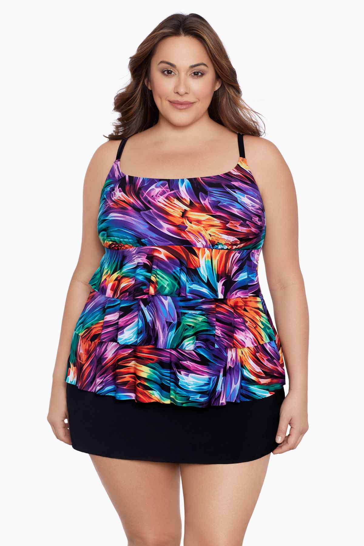 Woman wearing a rainbow ribbon printed ruffle skirtini swimsuit