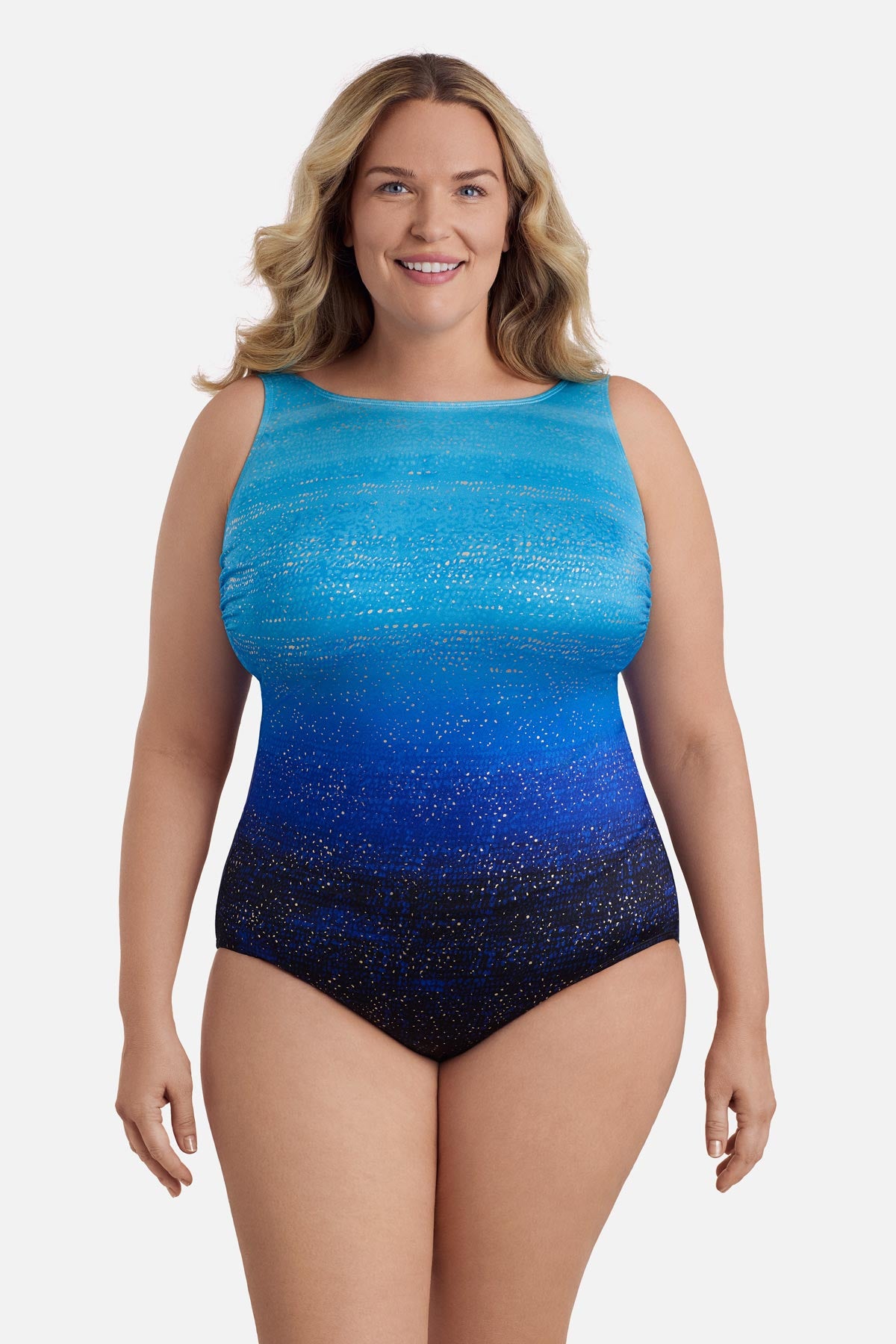 Woman wearing a blue ombre one-piece swimsuit with shimmer detail