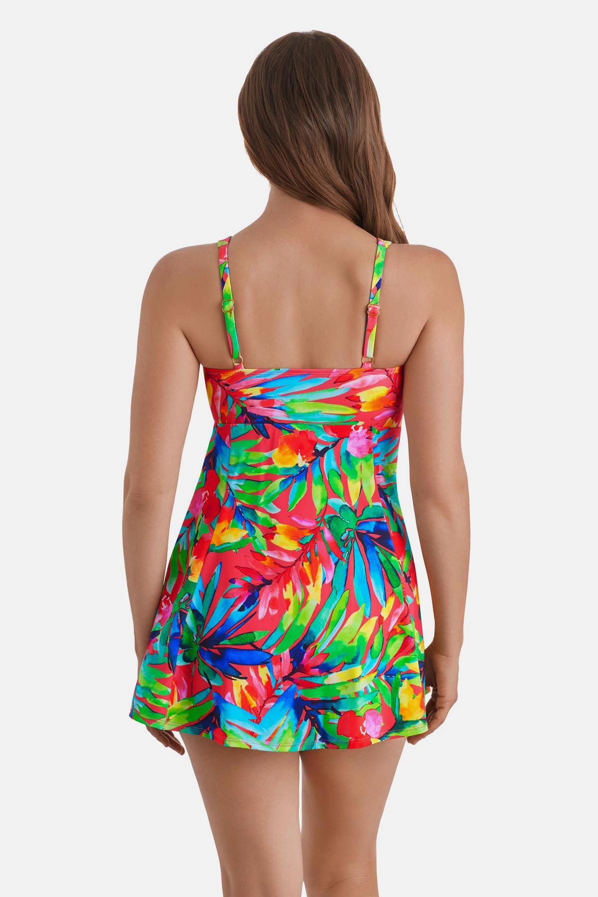 Woman turned away wearing a multicolor palm leaf printed swim dress