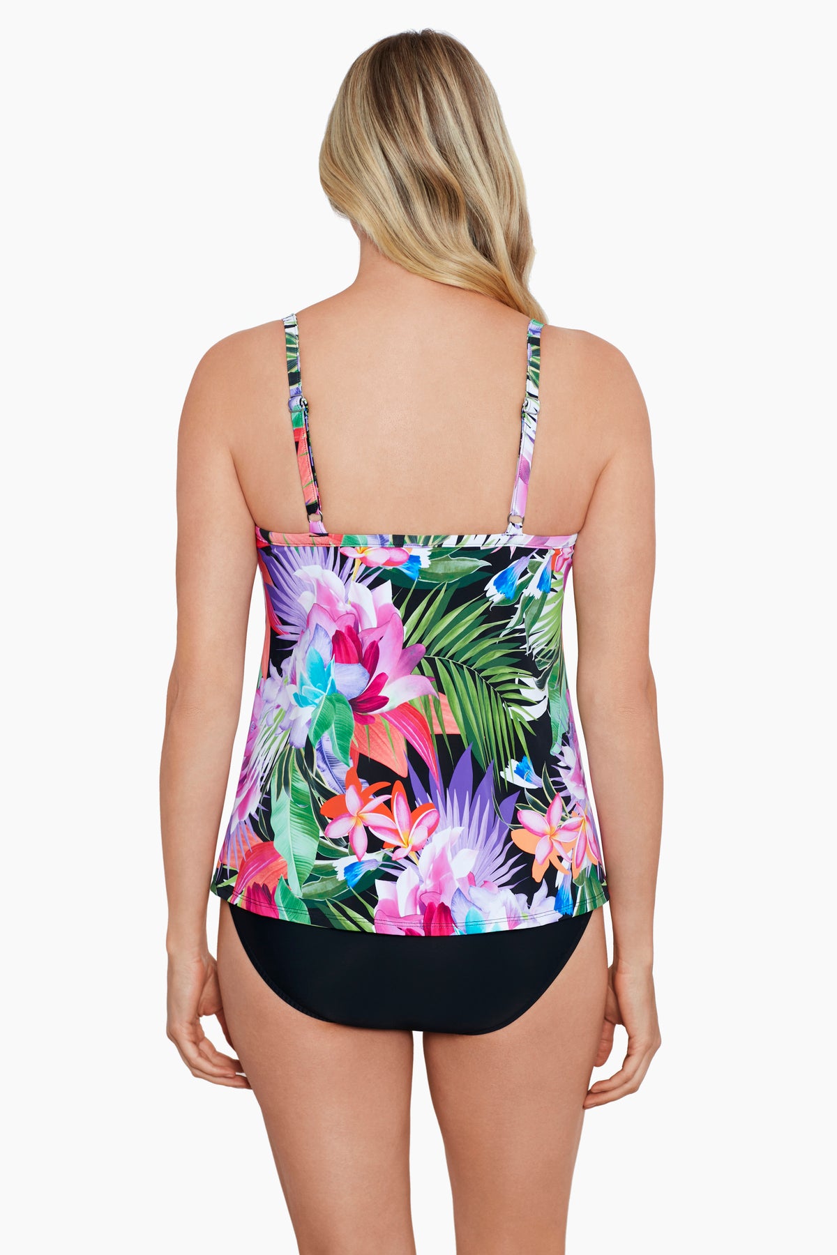 Woman turned away wearing a tropical printed middle split tankini top