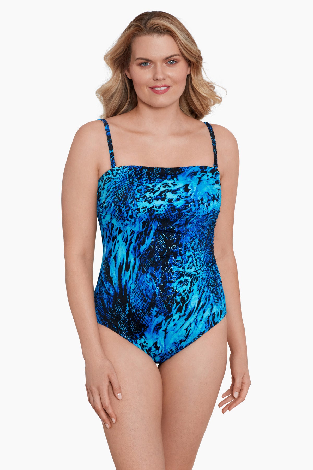 Woman wearing a black and blue abstract animal printed one-piece bandeau swimsuit with straps