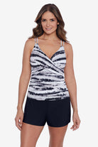 Woman wearing a black and white tie dye tankini top