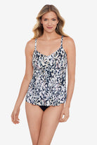 Woman wearing a leopard printed tankini top
