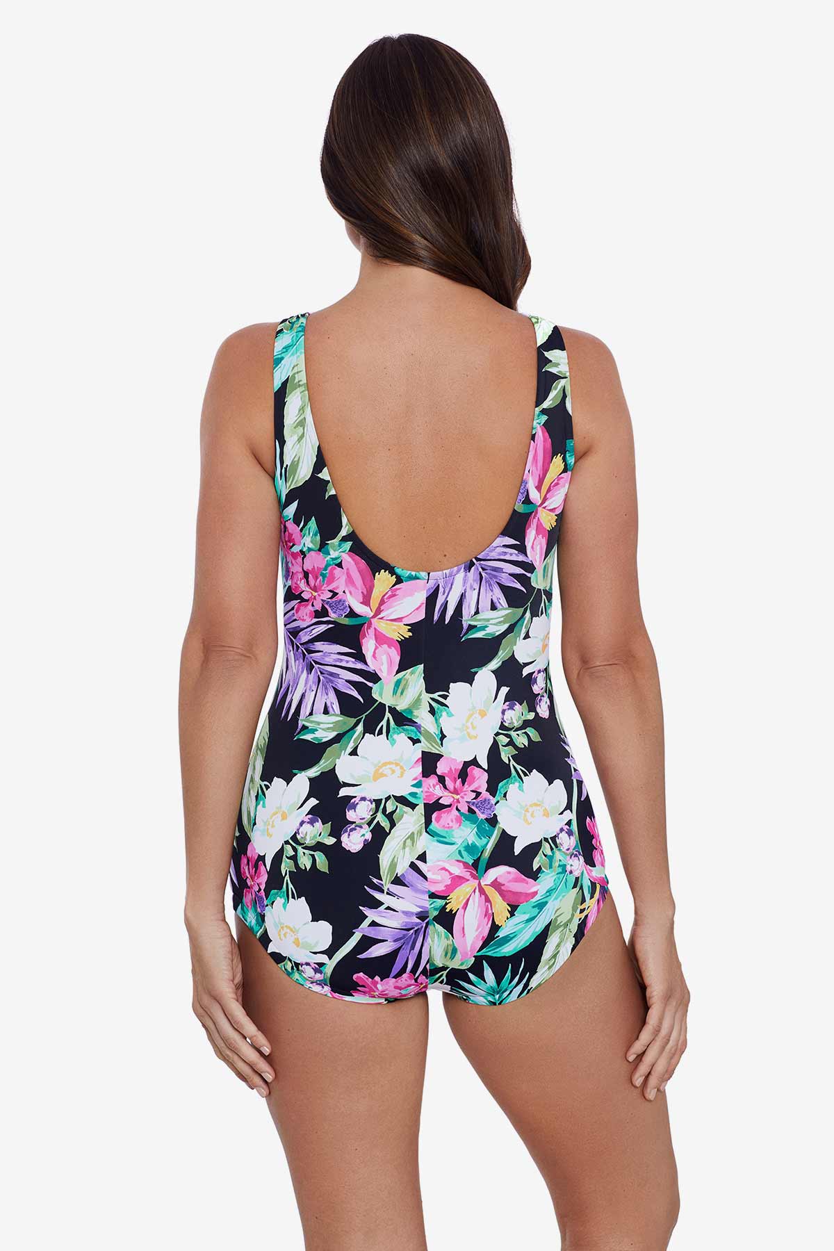 Woman faced away wearing a floral printed one-piece swimsuit
