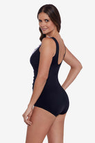 Woman faced left wearing a black one-piece swimsuit with ruffled piping down the front