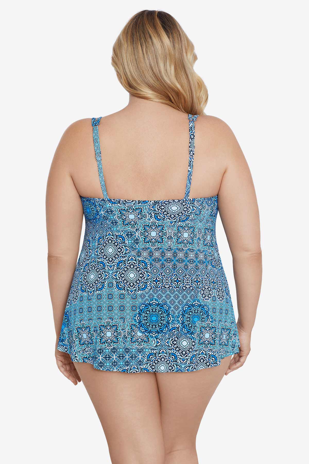 Woman faced away wearing a blue tile pattern tankini top
