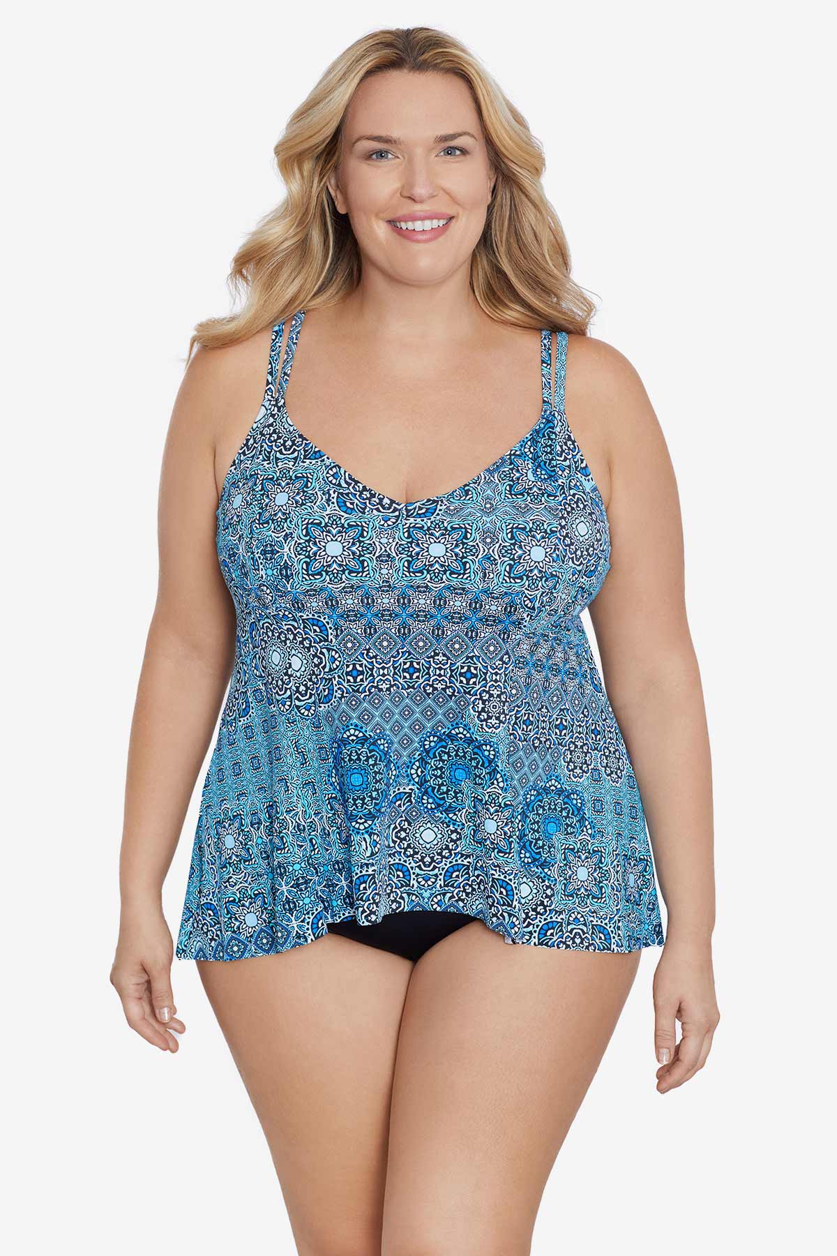 Woman wearing a blue tile pattern tankini top