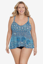 Woman wearing a blue tile pattern tankini top
