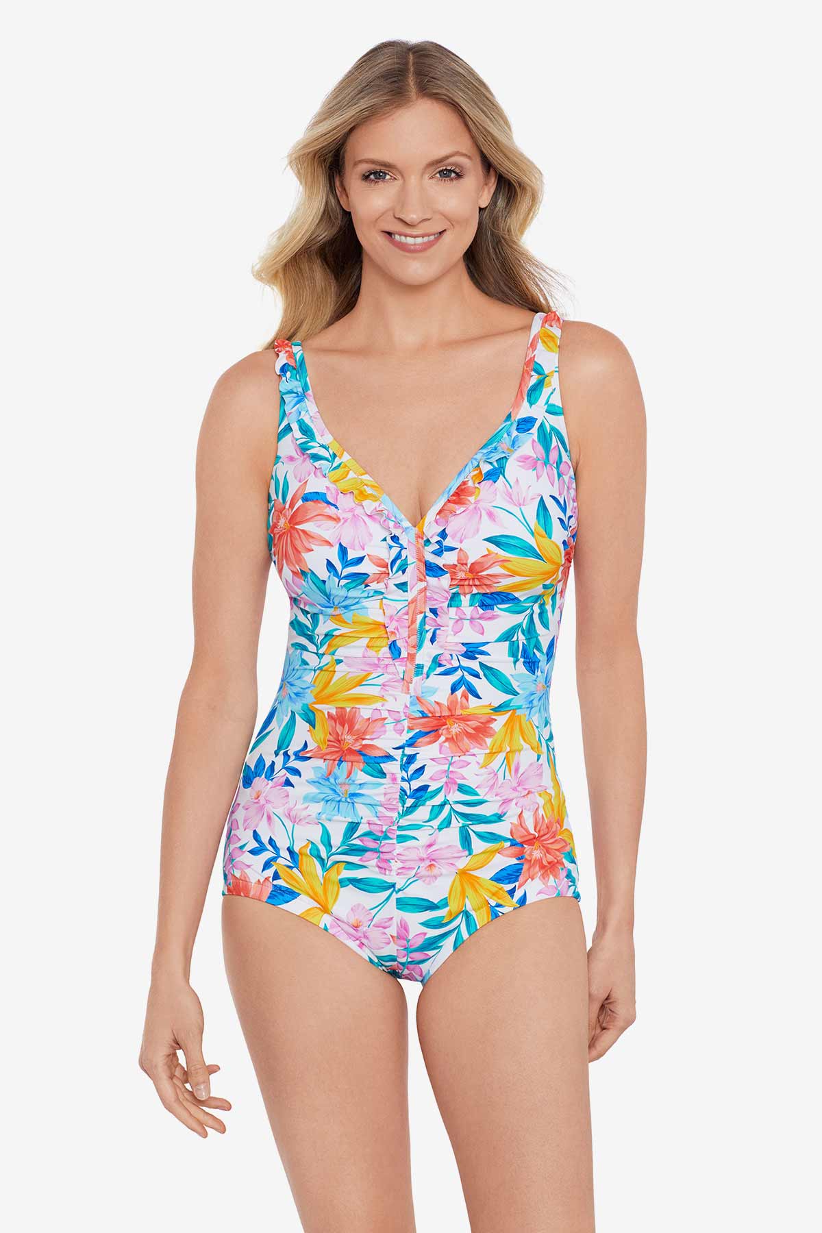 Woman wearing a multicolored tropical print front ruffle one-piece swimsuit