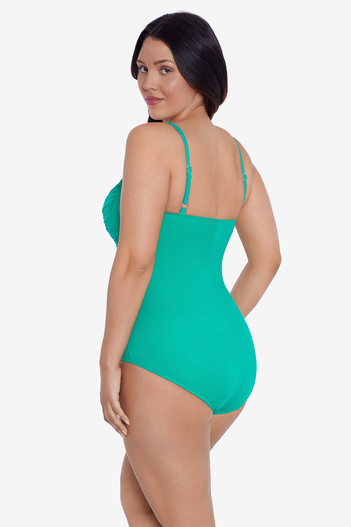 Woman turned left wearing a seafoam green one-piece swimsuit