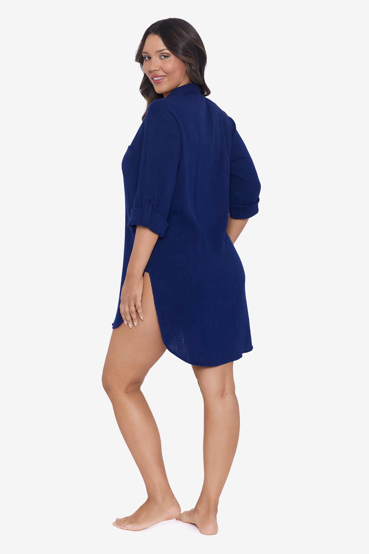 Woman turned left wearing a navy-blue shirt dress swim cover up