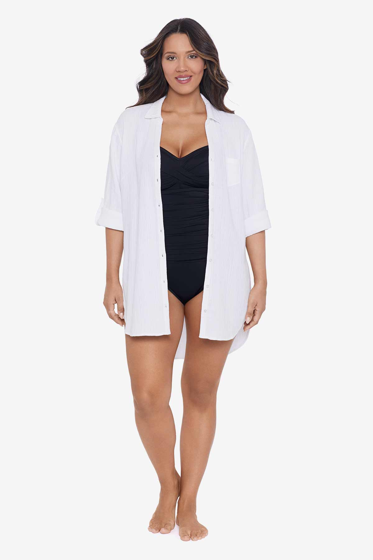 Woman wearing a white shirt dress swim cover up