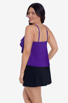 Woman turned left wearing a purple tankini top with ruffles