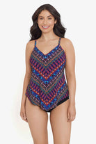 Woman wearing a multicolored tile printed tankini top