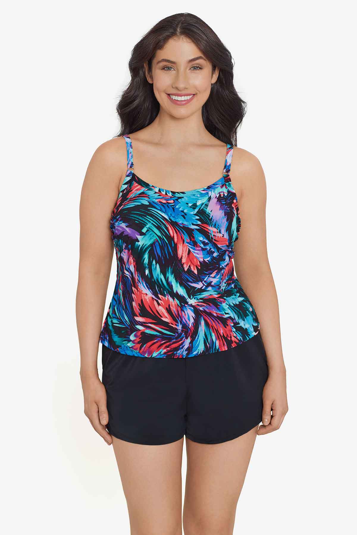 Woman wearing a multicolored feather pattern swim romper