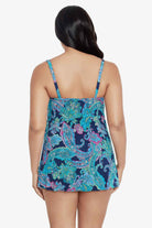 Woman turned away wearing a paisley printed swim dress 