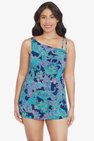 Woman wearing a paisley printed swim dress 