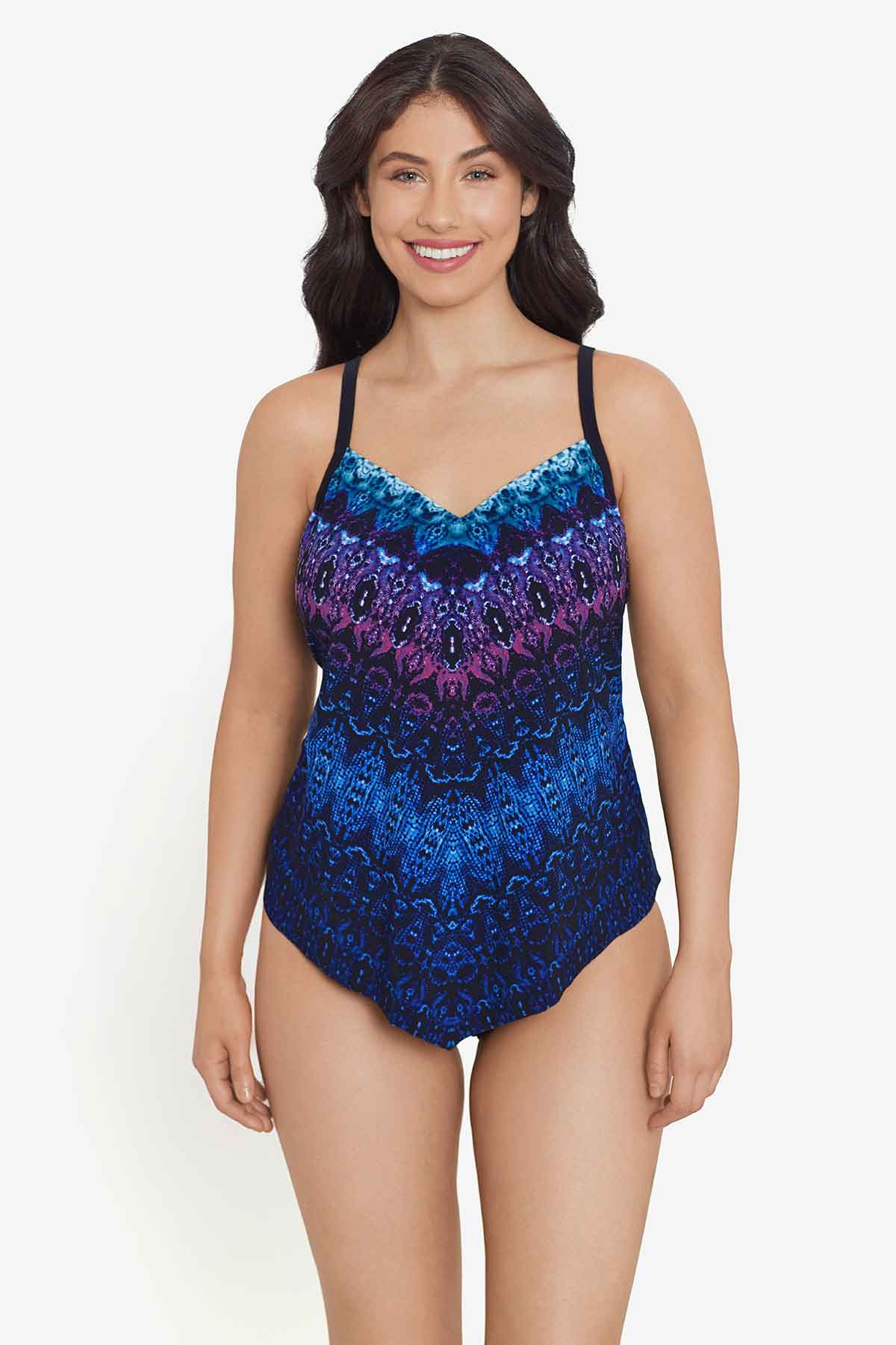 Woman wearing a blue and purple tile printed tankini top